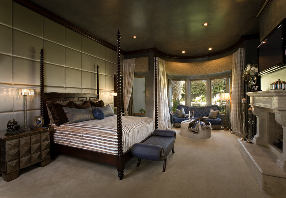 Photo of a mediterranean bedroom in Phoenix with a standard fireplace.