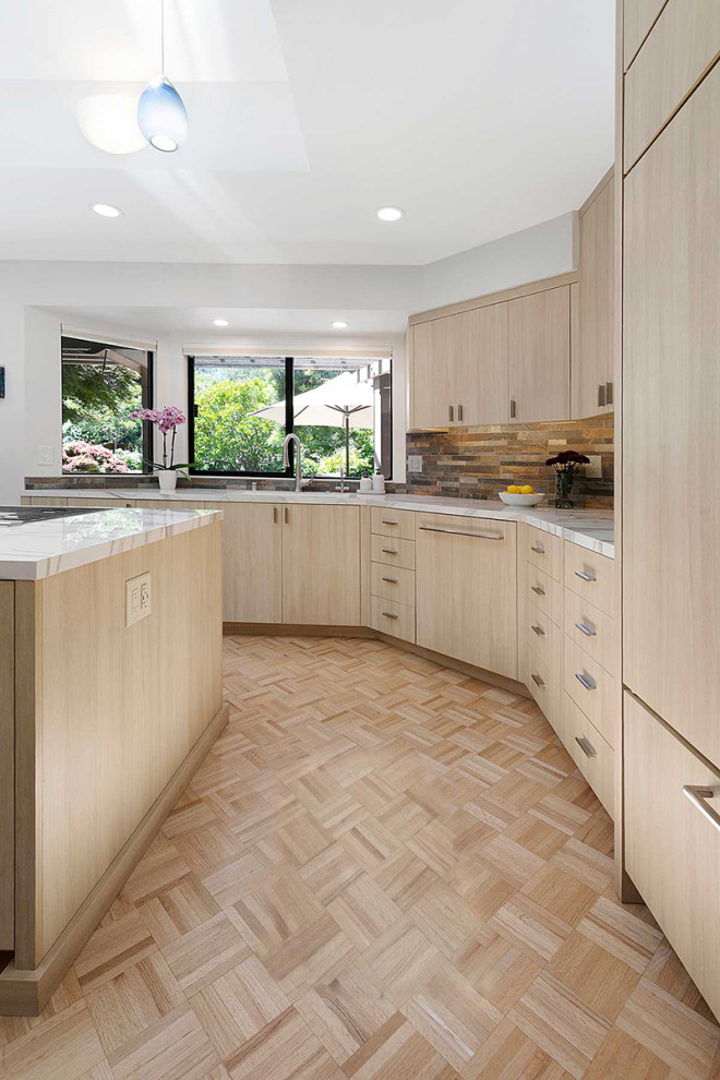 Large contemporary l-shaped kitchen/diner in San Francisco with a submerged sink, flat-panel cabinets, light wood cabinets, multi-coloured splashback, stone tiled splashback, integrated appliances, plywood flooring, an island, beige floors, white worktops and a vaulted ceiling.