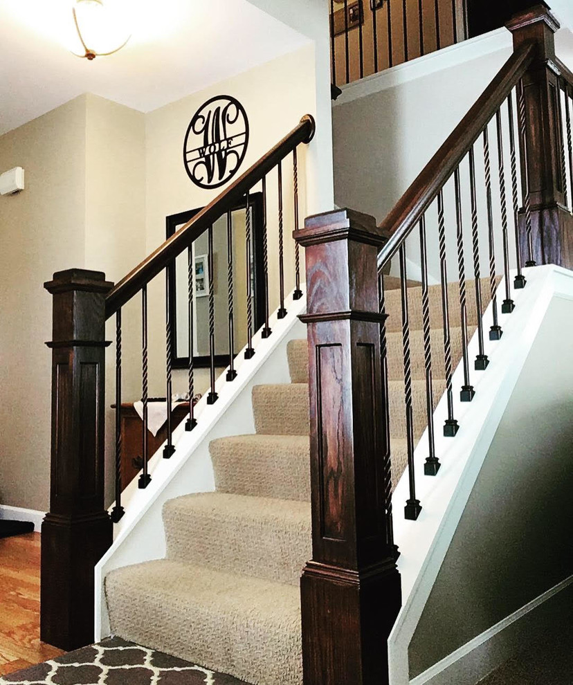 Design ideas for a mid-sized arts and crafts staircase in Minneapolis.