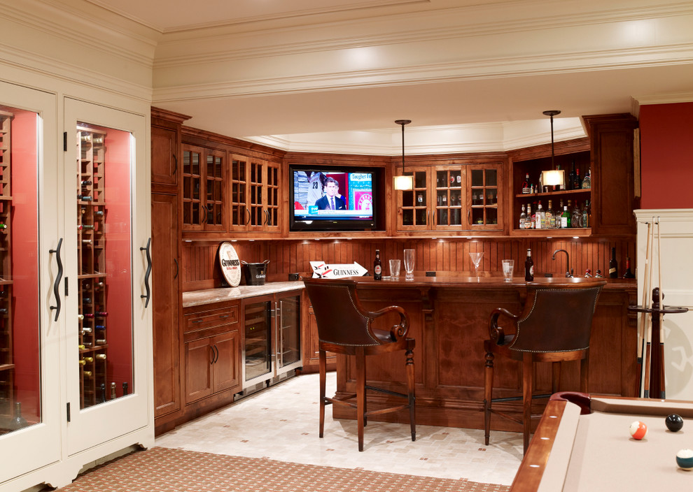This is an example of a mid-sized traditional wine cellar in New York with limestone floors and storage racks.