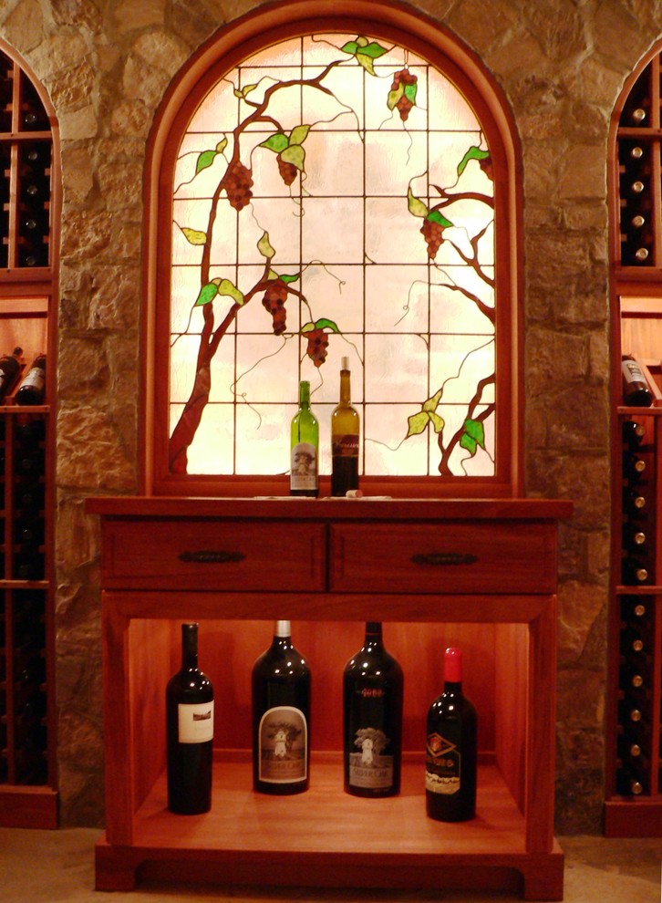 Design ideas for a traditional wine cellar in Raleigh.