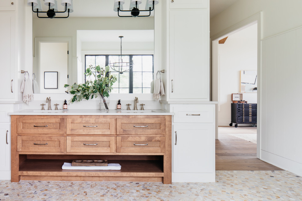 Country bathroom in Kansas City with shaker cabinets, medium wood cabinets, white walls, mosaic tile floors, an undermount sink, beige floor, white benchtops, a double vanity and a built-in vanity.