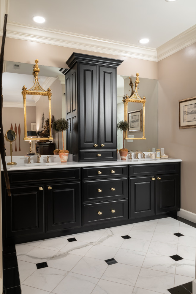 Inspiration for an expansive eclectic master bathroom in St Louis with raised-panel cabinets, black cabinets, a freestanding tub, a corner shower, white tile, marble, brown walls, marble floors, engineered quartz benchtops, white floor, a hinged shower door, white benchtops, a double vanity and a built-in vanity.