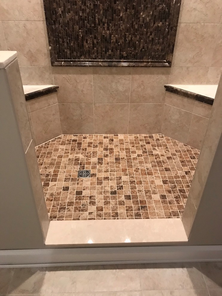 Design ideas for a large transitional master wet room bathroom in Richmond with raised-panel cabinets, grey cabinets, an undermount tub, a two-piece toilet, black and white tile, stone tile, blue walls, laminate floors, an undermount sink, quartzite benchtops, beige floor, an open shower and white benchtops.