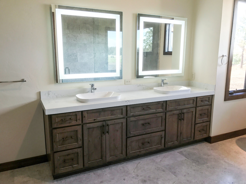 Freestanding bathtub - large transitional master white tile and marble tile travertine floor and beige floor freestanding bathtub idea with shaker cabinets, dark wood cabinets, beige walls, a drop-in sink, marble countertops and a hinged shower door