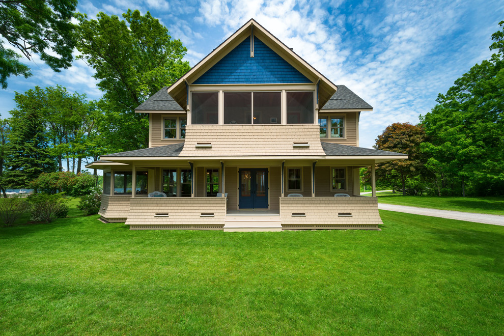 Inspiration for an arts and crafts two-storey exterior in New York with wood siding and a gable roof.