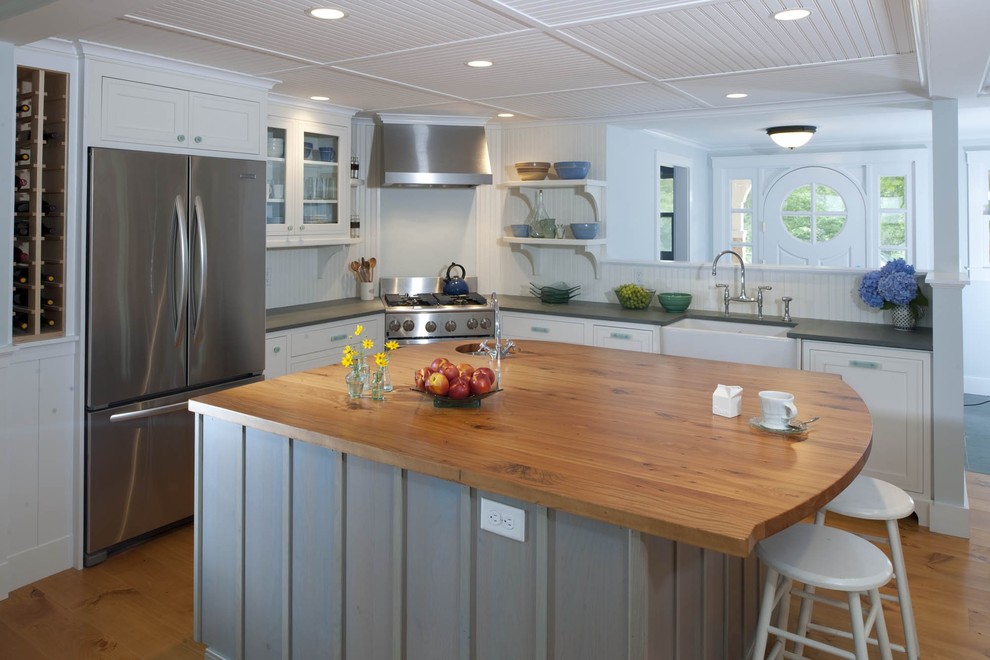 Design ideas for an eclectic kitchen in Newark with shaker cabinets and stainless steel appliances.