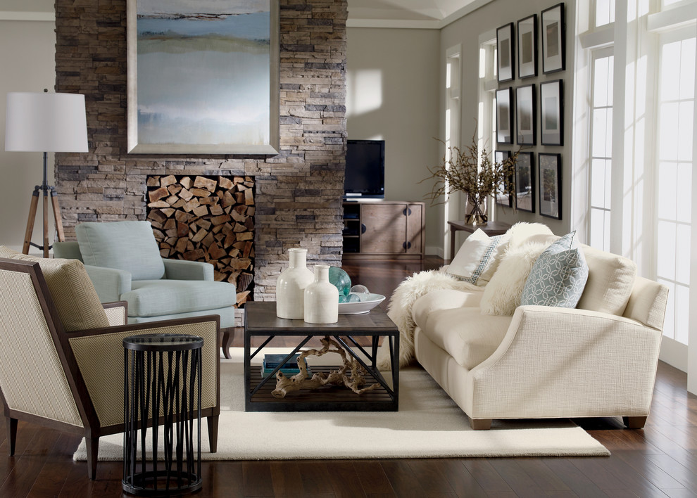 Photo of a mid-sized transitional formal open concept living room in New York with white walls, dark hardwood floors, a stone fireplace surround, no tv and brown floor.