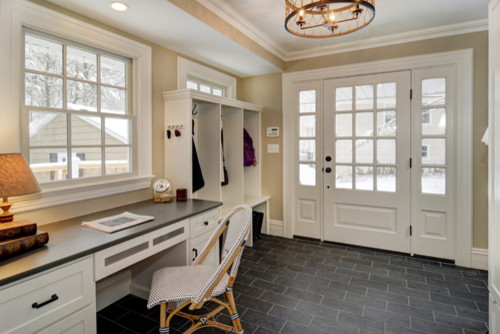 Mid-sized traditional mudroom in Newark with beige walls, porcelain floors, a single front door and a white front door.