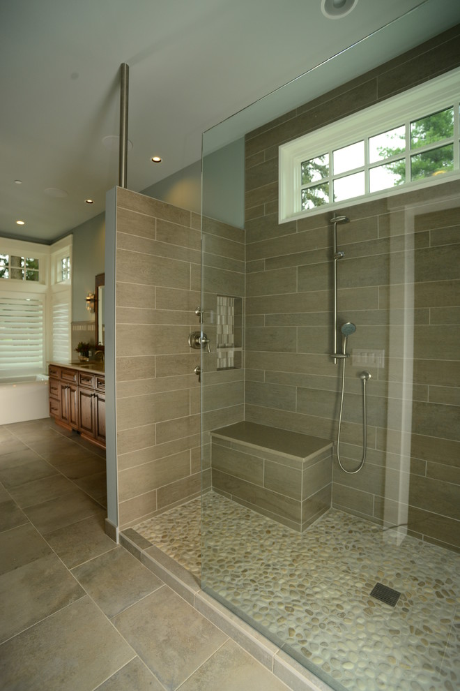 Inspiration for a large beach style master bathroom in Seattle with raised-panel cabinets, distressed cabinets, an undermount sink, engineered quartz benchtops, an open shower, gray tile, blue walls and porcelain floors.