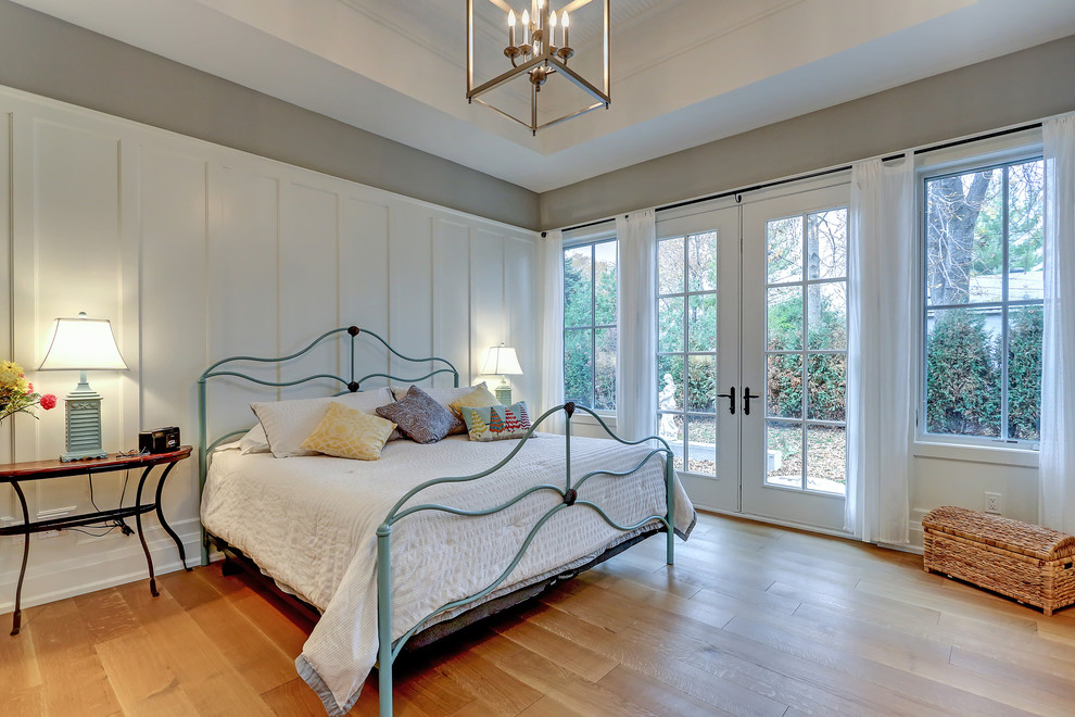 Design ideas for a traditional bedroom in Toronto with grey walls, light hardwood floors and no fireplace.