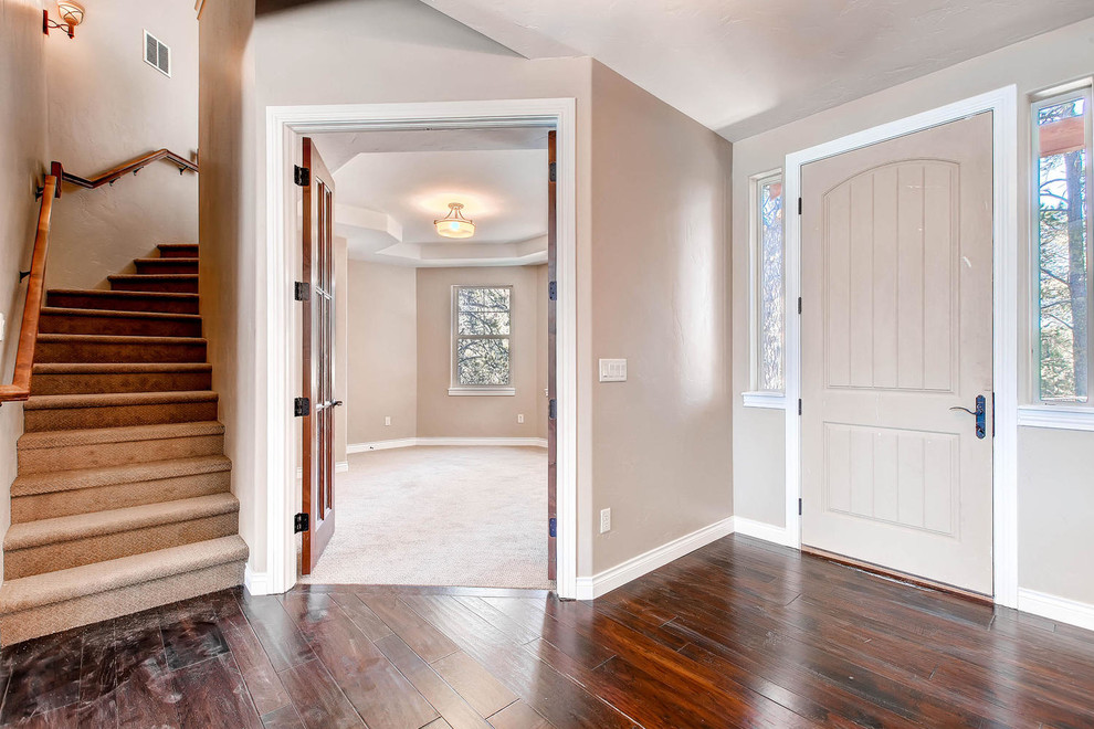 Example of an arts and crafts entryway design in Denver