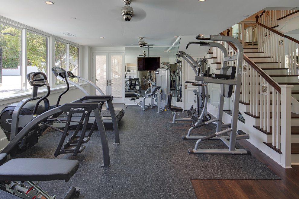 Inspiration for a mid-sized contemporary multipurpose gym in Los Angeles with white walls.