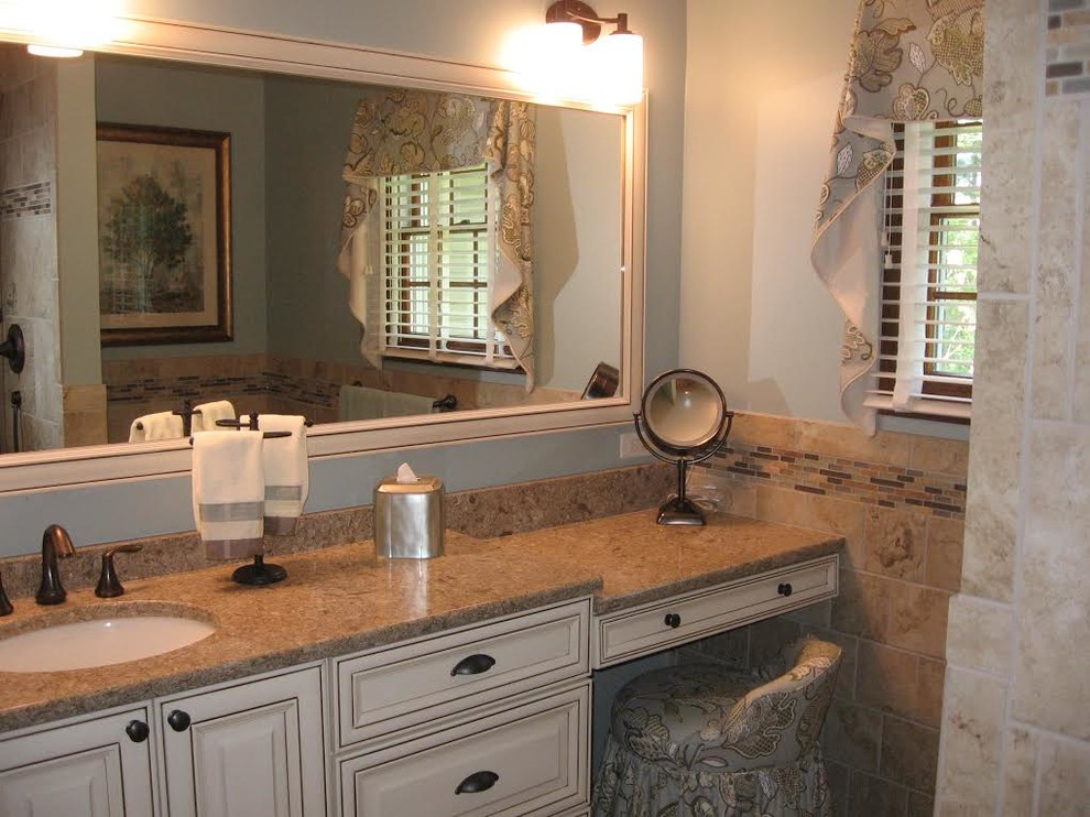 Design ideas for a mid-sized traditional master bathroom in Detroit with an undermount sink, raised-panel cabinets, beige cabinets, quartzite benchtops, an alcove shower, a two-piece toilet, beige tile, porcelain tile, blue walls and porcelain floors.