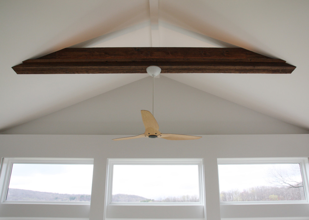 Home design - large transitional loft-style light wood floor and beige floor home design idea in Bridgeport with blue walls