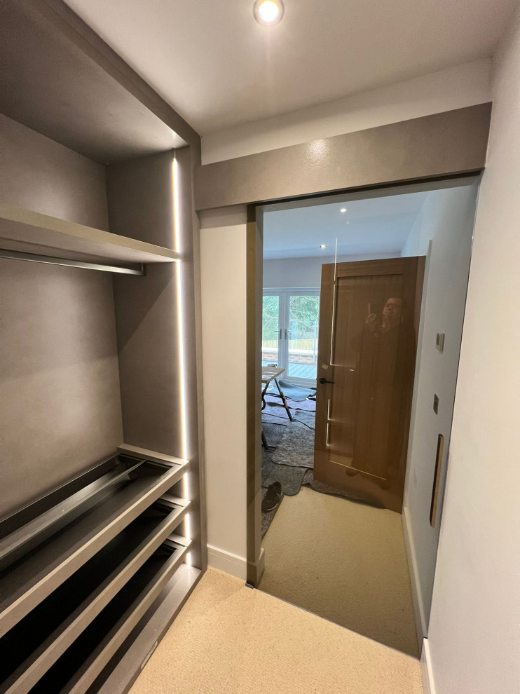 Inspiration for a modern storage and wardrobe in West Midlands.