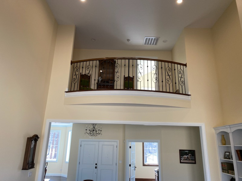 2-story living room ceiling with upstairs balcony view