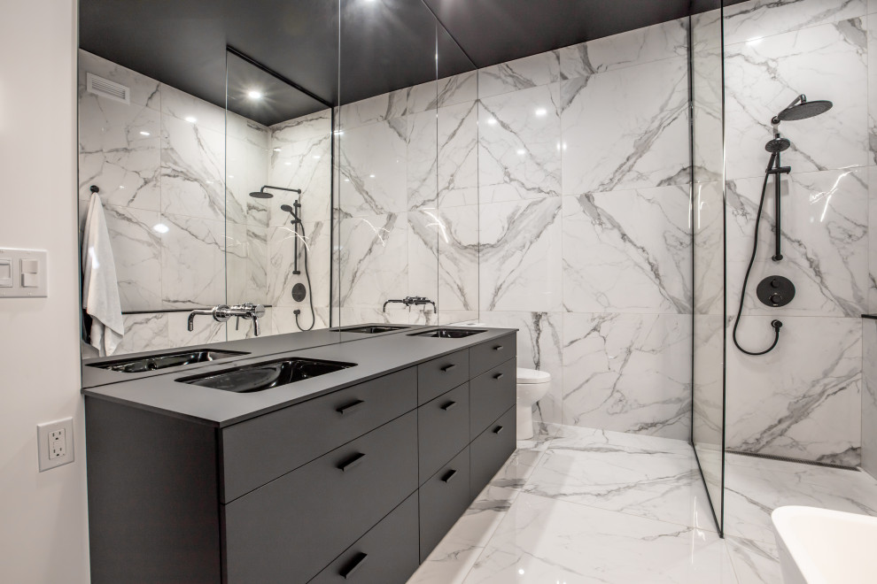 Design ideas for a large modern master bathroom in New York with black cabinets, a freestanding tub, an open shower, black and white tile, ceramic tile, multi-coloured walls, ceramic floors, a drop-in sink, engineered quartz benchtops, multi-coloured floor, an open shower, black benchtops and a double vanity.