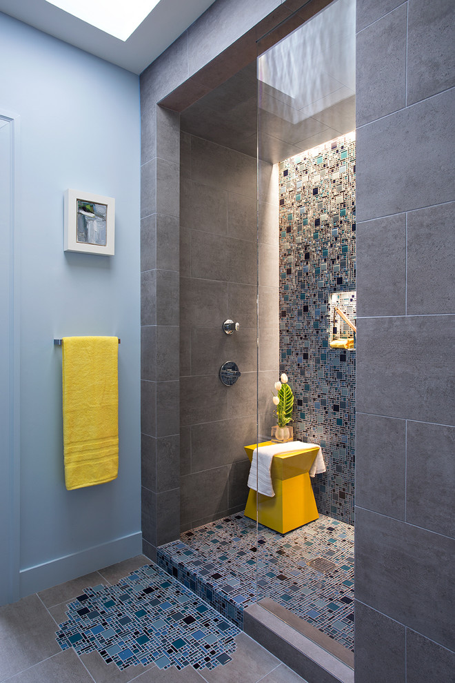 Inspiration for a small modern kids bathroom in San Francisco with a wall-mount sink, furniture-like cabinets, solid surface benchtops, an open shower, a one-piece toilet, blue tile, mosaic tile, blue walls and porcelain floors.
