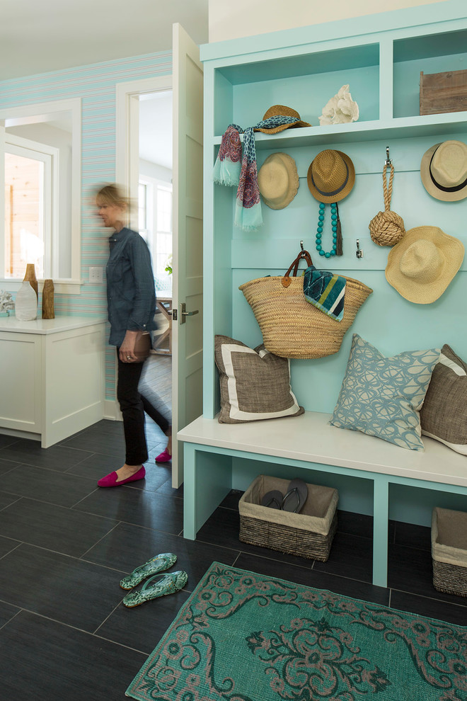 Design ideas for a transitional mudroom in Minneapolis with grey floor and blue walls.