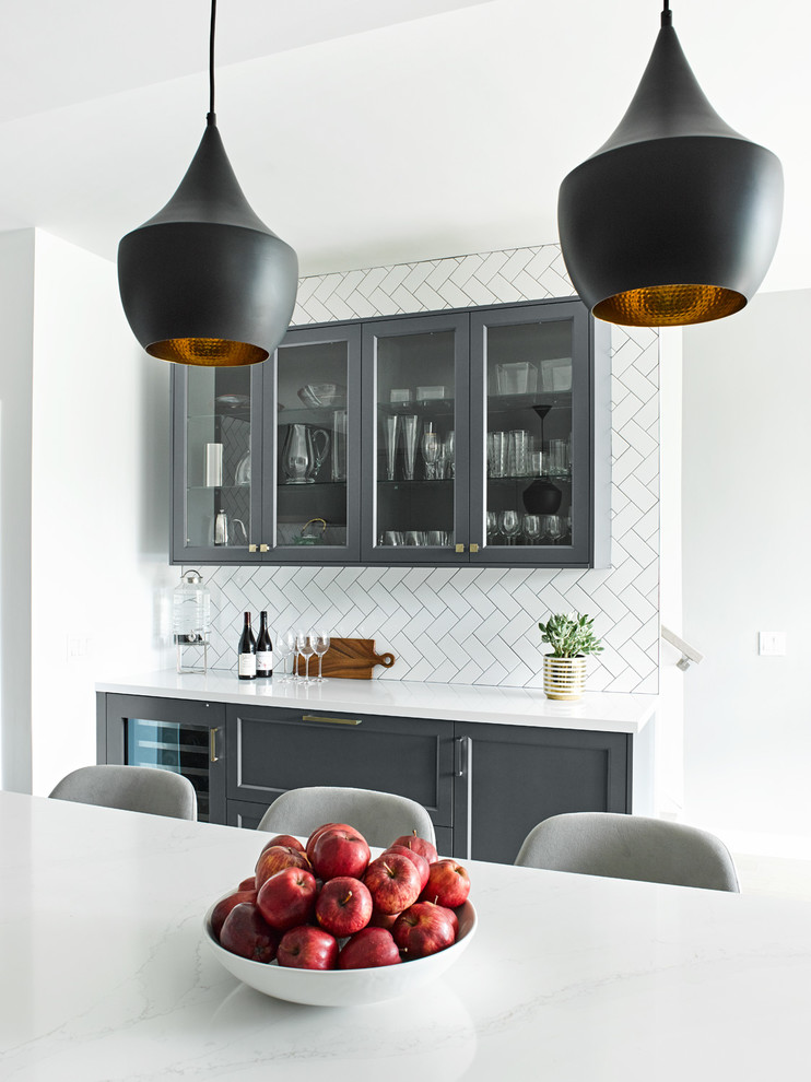 Example of a transitional home design design in Toronto