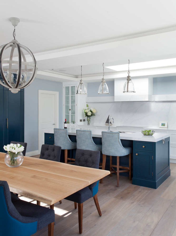 Inspiration for a large transitional kitchen remodel in Dublin with recessed-panel cabinets, blue cabinets and an island