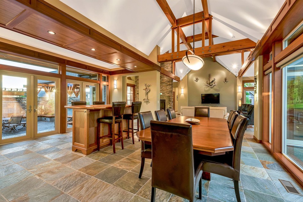 Example of a porcelain tile and multicolored floor kitchen/dining room combo design in Seattle with beige walls