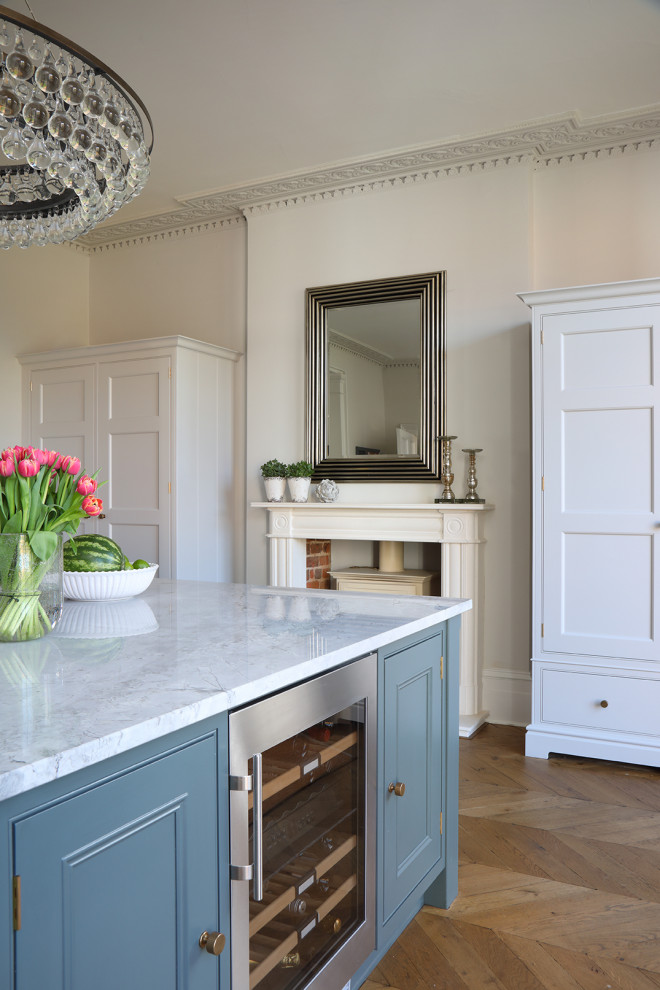 Photo of a large classic kitchen in Hampshire with flat-panel cabinets.