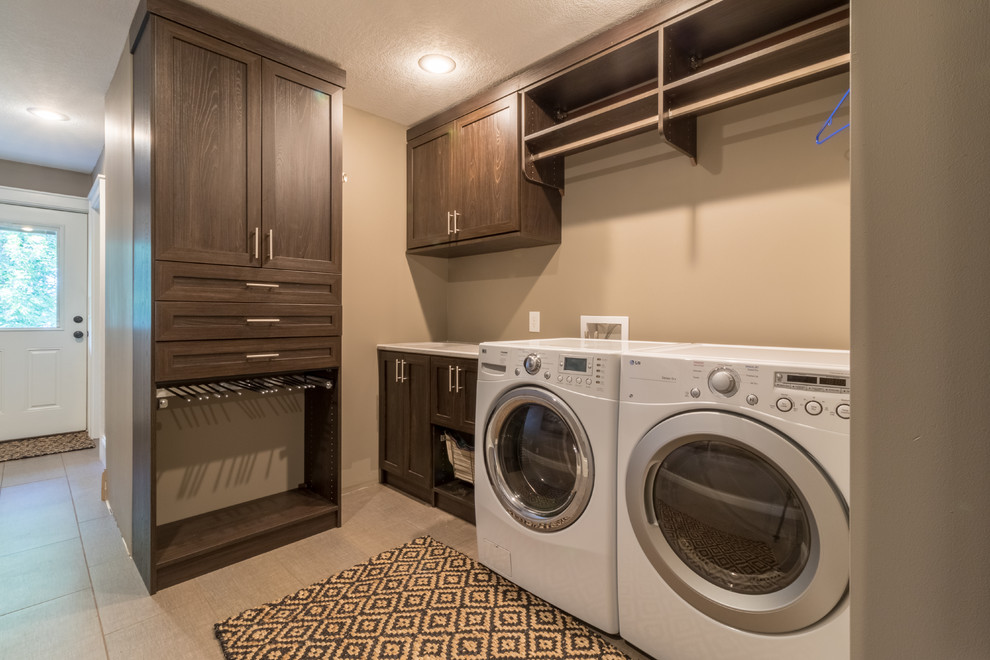 Inspiration for a mid-sized contemporary l-shaped dedicated laundry room in Minneapolis with an undermount sink, shaker cabinets, dark wood cabinets, quartzite benchtops, beige walls and a side-by-side washer and dryer.