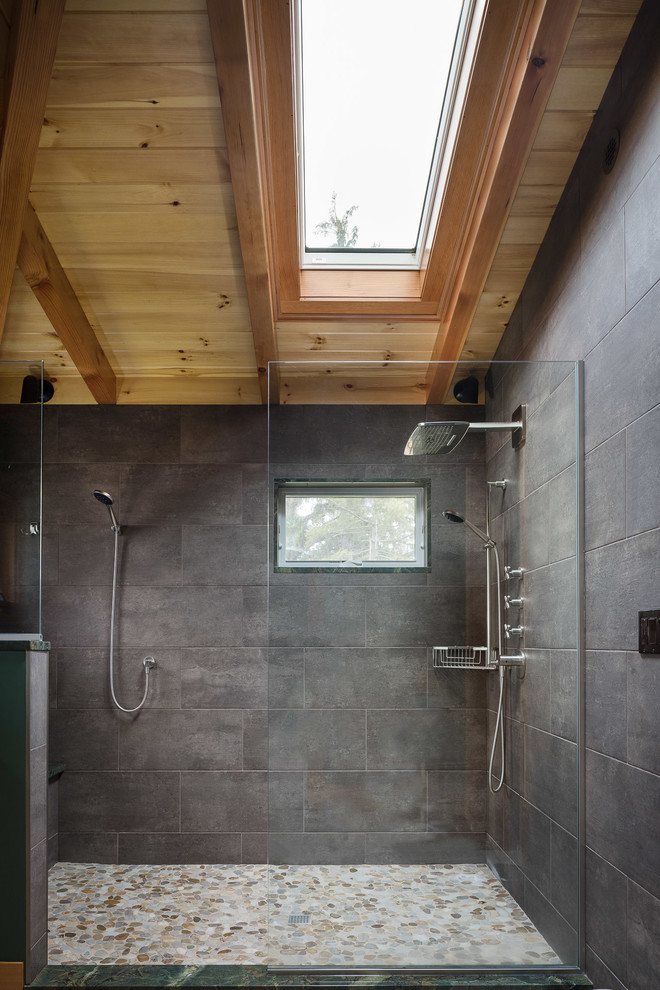 Mid-sized country master bathroom in Burlington with an open shower, gray tile, slate, grey walls, pebble tile floors and an open shower.