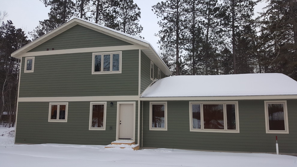 Mountain style concrete fiberboard multicolored home design photo in Minneapolis
