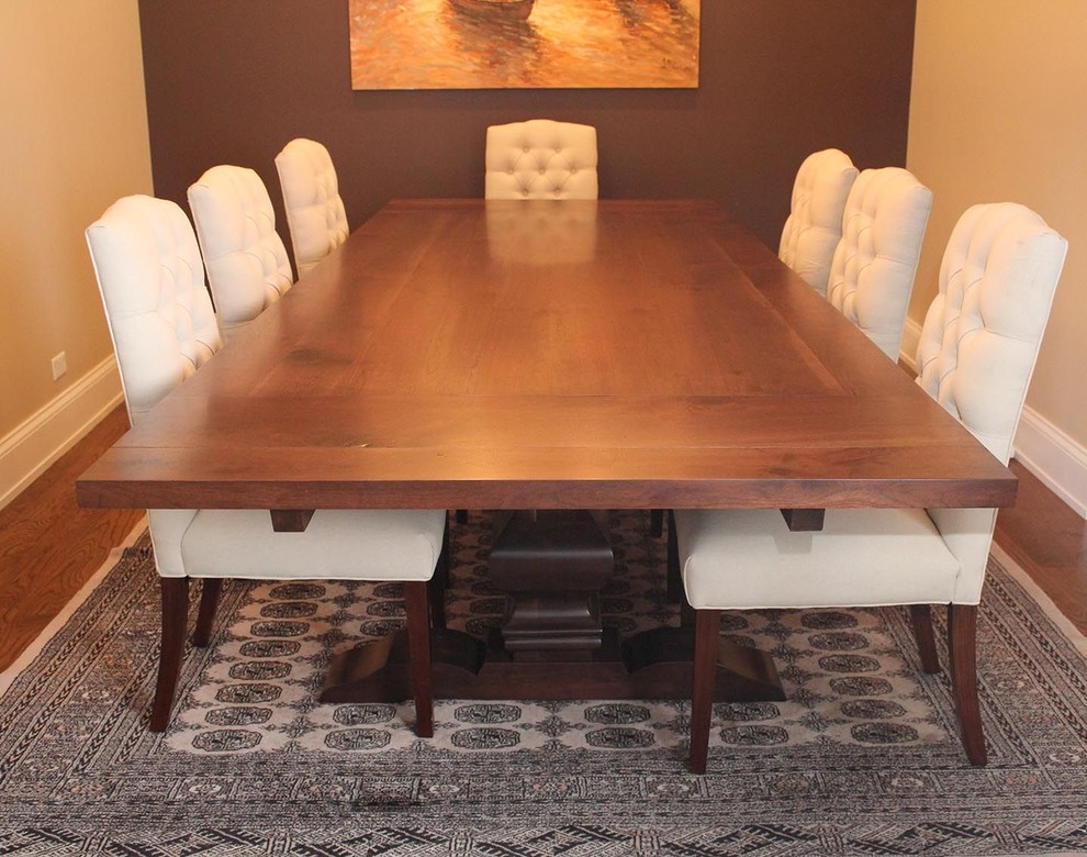 This is an example of a large arts and crafts dining room in Chicago.