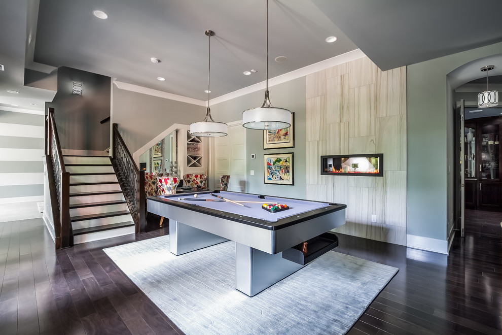 Inspiration for a transitional basement in Nashville with grey walls and dark hardwood floors.