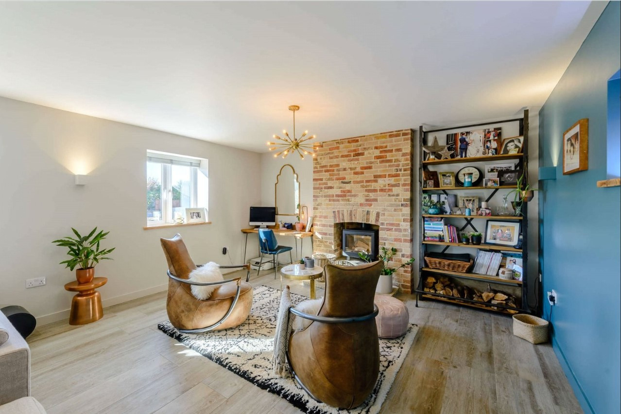 Living room with woodburner in feature wall