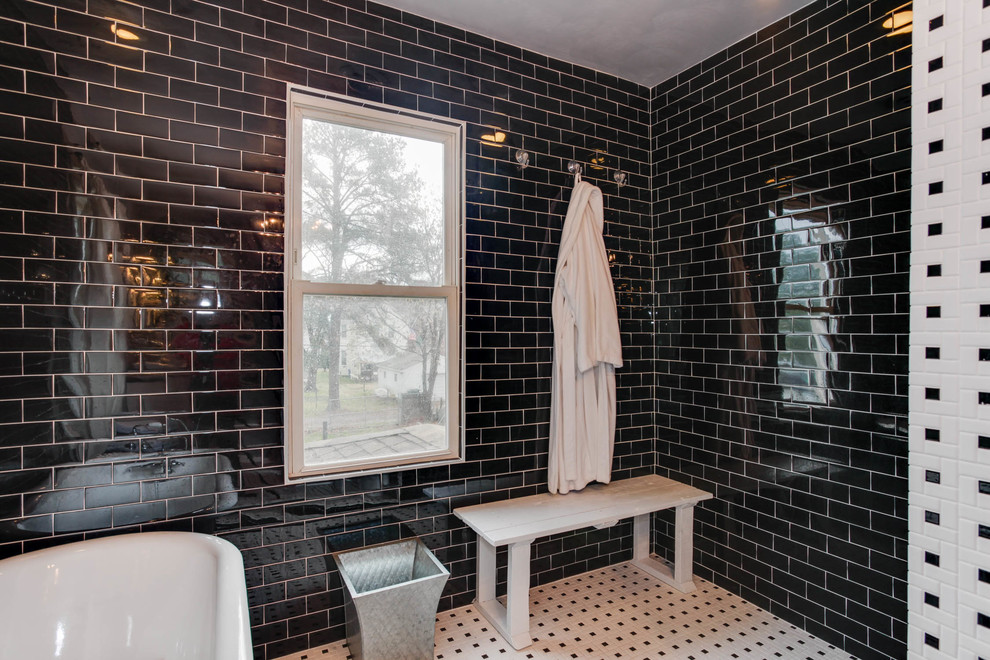 Large transitional master bathroom in Other with furniture-like cabinets, distressed cabinets, a claw-foot tub, a shower/bathtub combo, a one-piece toilet, black and white tile, ceramic tile, beige walls, ceramic floors, a vessel sink and wood benchtops.