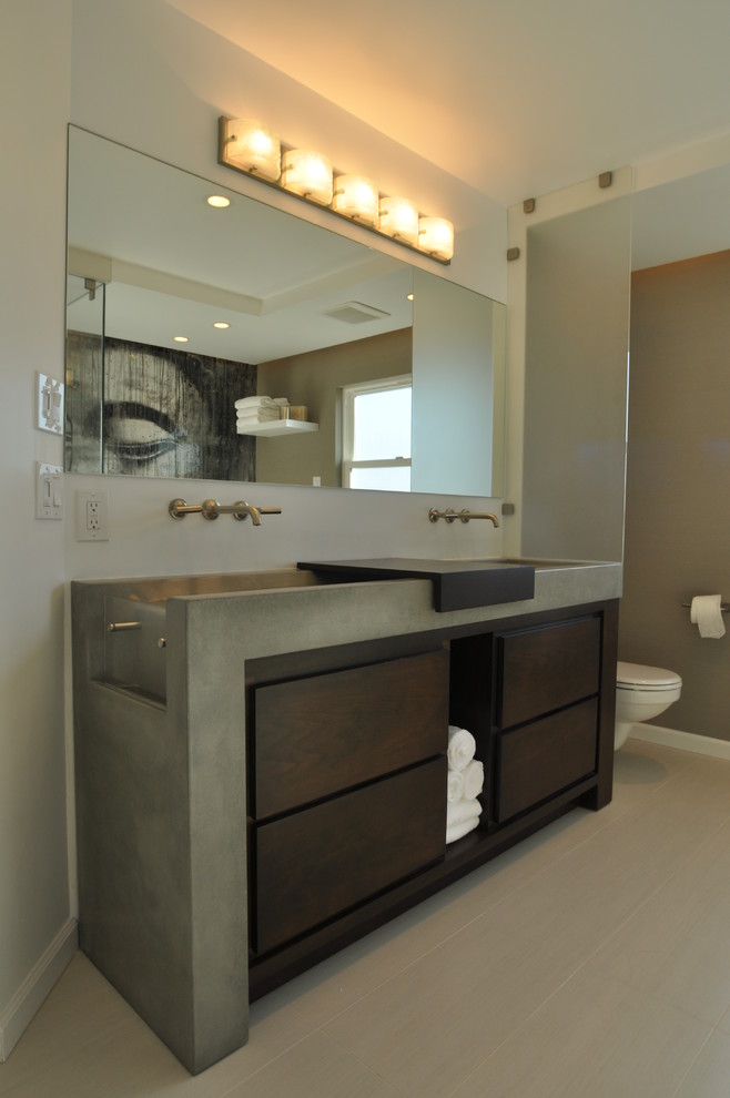 Design ideas for a mid-sized contemporary master bathroom in Los Angeles with flat-panel cabinets, white cabinets, a freestanding tub, a corner shower, white tile, multi-coloured walls, porcelain floors, an integrated sink and concrete benchtops.