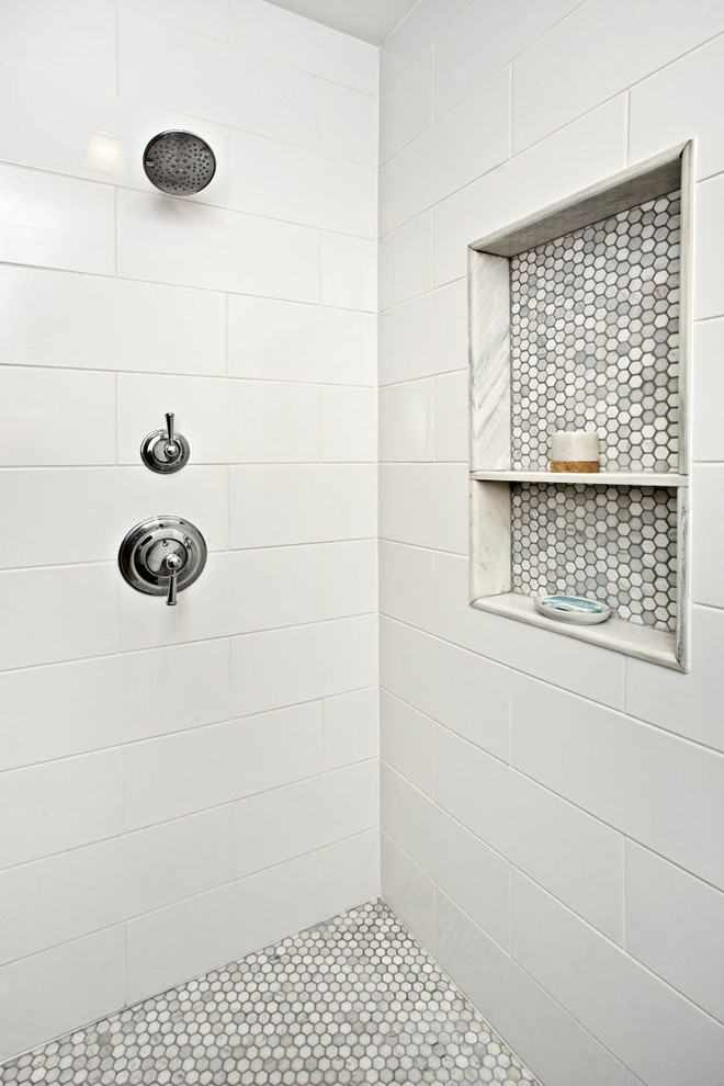 Photo of a traditional master bathroom in Minneapolis with a double shower, ceramic tile, mosaic tile floors and white tile.