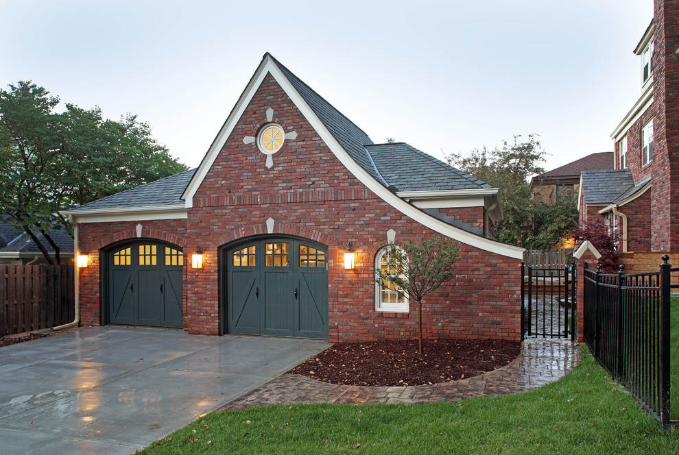 Photo of a traditional attached two-car garage in Omaha.