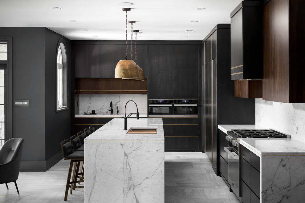 Contemporary kitchen in Toronto with an undermount sink, flat-panel cabinets, black cabinets, marble benchtops, white splashback, marble splashback, with island, white floor, white benchtop and marble floors.