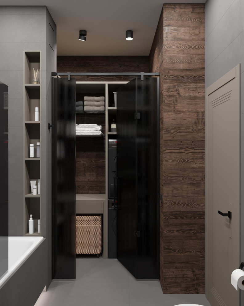 Свежая идея для дизайна: главная ванная комната со стиральной машиной в современном стиле с ванной в нише, инсталляцией, тумбой под одну раковину и подвесной тумбой - отличное фото интерьера