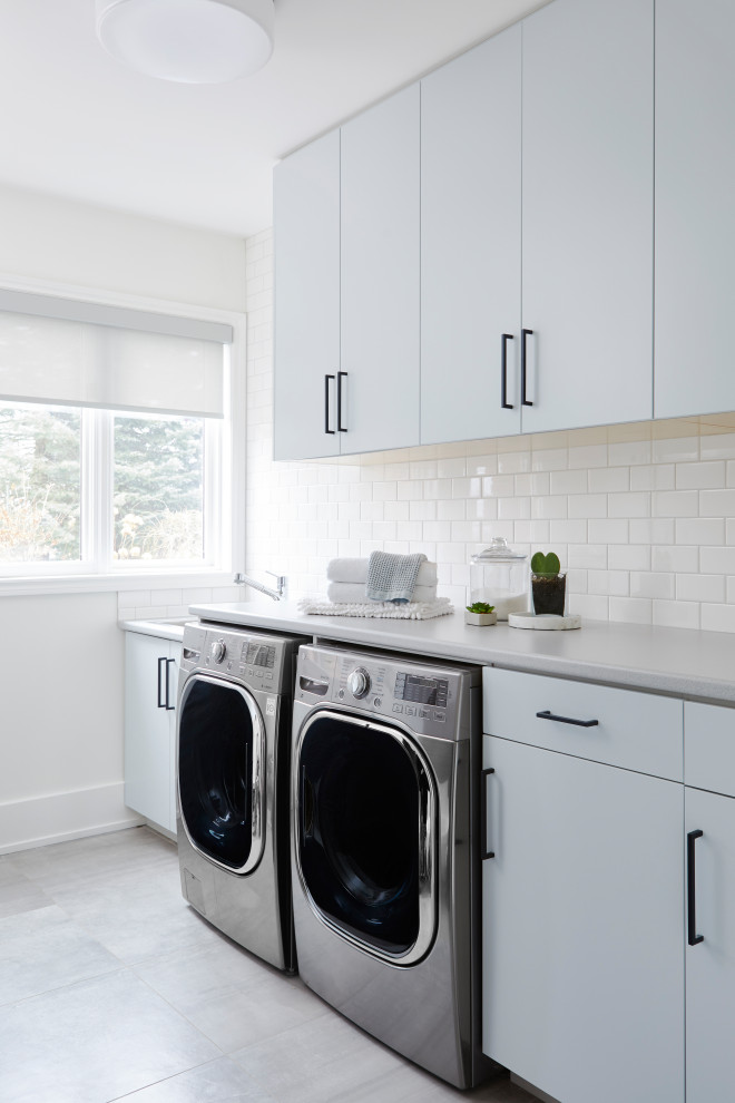 Laundry room - scandinavian laundry room idea in Other