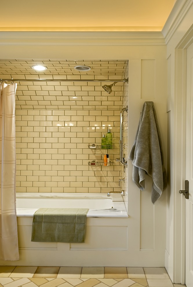 Design ideas for a traditional bathroom in Burlington with subway tile and beige tile.