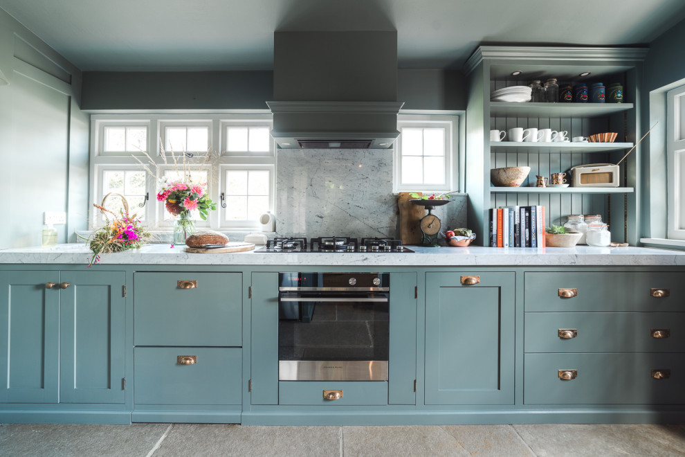 Design ideas for a small transitional kitchen in Sussex.
