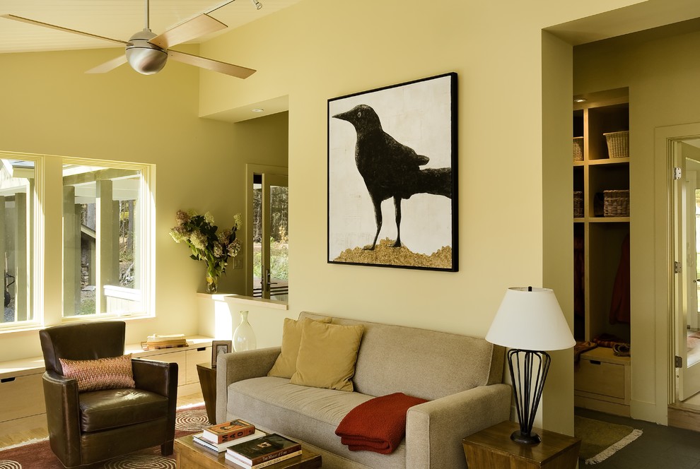 Photo of a contemporary living room in Burlington with yellow walls.