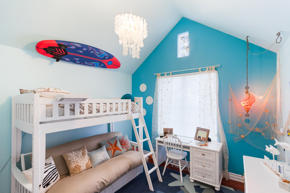 Beach style gender-neutral kids' bedroom in Denver with dark hardwood floors and multi-coloured walls.