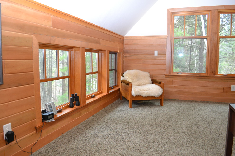 Inspiration for a mid-sized rustic loft-style carpeted bedroom remodel with white walls