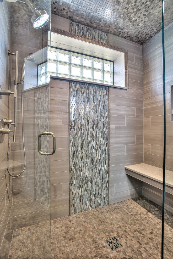 This is an example of a mid-sized country 3/4 bathroom in Denver with shaker cabinets, dark wood cabinets, an alcove shower, a two-piece toilet, multi-coloured tile, matchstick tile, green walls, slate floors, a drop-in sink and engineered quartz benchtops.