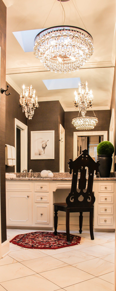 Example of a transitional white tile and ceramic tile ceramic tile bathroom design with white cabinets, brown walls and granite countertops