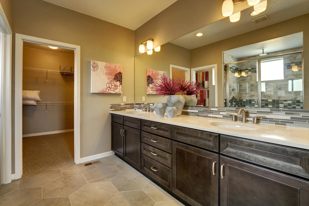 Example of a large transitional master gray tile, white tile and glass tile bathroom design in Denver with recessed-panel cabinets, dark wood cabinets, beige walls, an undermount sink and quartzite countertops