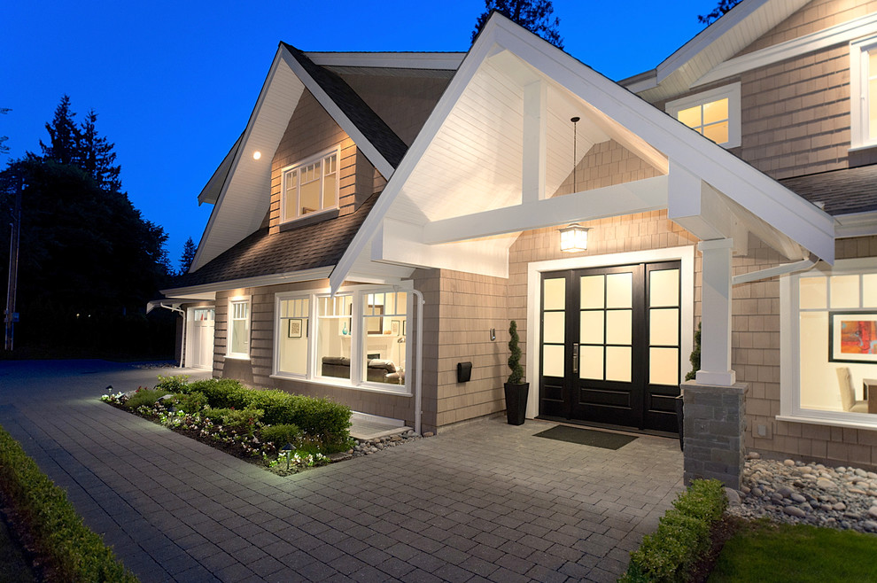 Inspiration for a traditional exterior in Vancouver with wood siding.